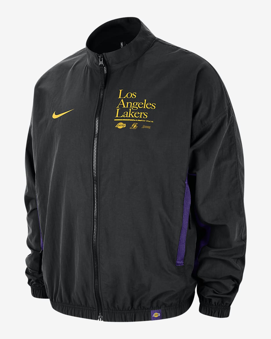 Chamarra Nike de tejido Woven de la NBA con grafico para hombre Los Angeles Lakers DNA Courtside. Nike